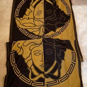 100% Authentic Versace Medusa scarf. As seen on photos there’s a few small snags